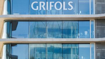 FILE PHOTO: The logo of the Spanish pharmaceuticals company Grifols is pictured on their headquarters' building in Sant Cugat del Valles, near Barcelona, Spain, September 17, 2021. REUTERS/Albert Gea/File Photo