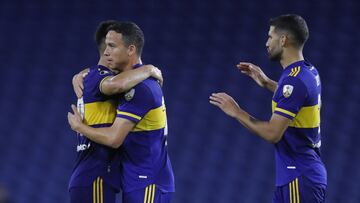 BUENOS AIRES, ARGENTINA - APRIL 27: Gonzalo Agustin Sandez of Boca Juniors celebrates with Leonardo Jara and Lisandro Lopez after winning a match between Boca Juniors and Santos as part of Group C of Copa CONMEBOL Libertadores 2021 at Estadio Alberto J. Armando on April 27, 2021 in Buenos Aires, Argentina. (Photo by Juan Ignacio Roncoroni - Pool/Getty Images)