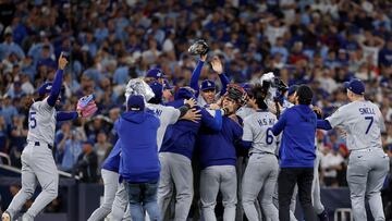 TORONTO, ONTARIO - NOVEMBER 02: Pitcher Yoshinobu Yamamoto #18 of the Los Angeles Dodgers celebrates with teammates after defeating the Toronto Blue Jays, 5-4, in game seven of the 2025 World Series at Rogers Center on November 02, 2025 in Toronto, Ontario. Emilee Chinn/Getty Images/AFP (Photo by Emilee Chinn / GETTY IMAGES NORTH AMERICA / Getty Images via AFP)