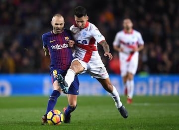 Andrés Iniesta con Hernán Pérez.