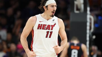 PHOENIX, ARIZONA - JANUARY 25: Jaime Jaquez Jr. #11 of the Miami Heat reacts to a three-point shot against the Phoenix Suns during the second half of the NBA game at Mortgage Matchup Center on January 25, 2026 in Phoenix, Arizona. NOTE TO USER: User expressly acknowledges and agrees that, by downloading and or using this photograph, user is consenting to the terms and conditions of the Getty Images License Agreement. Christian Petersen/Getty Images/AFP (Photo by Christian Petersen / GETTY IMAGES NORTH AMERICA / Getty Images via AFP)