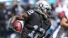 (FILES) In this file photo taken on September 22, 2018 MIAMI, FL - SEPTEMBER 23: Martavis Bryant #12 of the Oakland Raiders runs for yardage during the second quarter against the Miami Dolphins at Hard Rock Stadium on September 23, 2018 in Miami, Florida.   Marc Serota/Getty Images/AFP - Oakland Raiders wide receiver Martavis Bryant was suspended indefinitely by the NFL on Friday, Deember 14, 2018 for violating the terms of his reinstatement from a prior ban. &quot;Effective immediately, Martavis Bryant has been returned to the Reserve/Commissioner Suspended list indefinitely for violating the terms of his April 2017 conditional reinstatement under the Policy and Program for Substances of Abuse,&quot; the league said. (Photo by Marc SEROTA / GETTY IMAGES NORTH AMERICA / AFP)