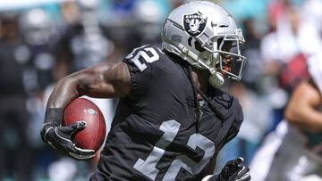 (FILES) In this file photo taken on September 22, 2018 MIAMI, FL - SEPTEMBER 23: Martavis Bryant #12 of the Oakland Raiders runs for yardage during the second quarter against the Miami Dolphins at Hard Rock Stadium on September 23, 2018 in Miami, Florida.   Marc Serota/Getty Images/AFP - Oakland Raiders wide receiver Martavis Bryant was suspended indefinitely by the NFL on Friday, Deember 14, 2018 for violating the terms of his reinstatement from a prior ban. &quot;Effective immediately, Martavis Bryant has been returned to the Reserve/Commissioner Suspended list indefinitely for violating the terms of his April 2017 conditional reinstatement under the Policy and Program for Substances of Abuse,&quot; the league said. (Photo by Marc SEROTA / GETTY IMAGES NORTH AMERICA / AFP)