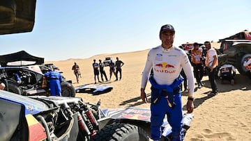 Ford Racing�s Spanish driver Nani Roma stands next to his car at the end of the Stage 9, a marathon stage, of the 48th edition of the Dakar Rally 2026, between Wadi ad-Dawasir and Bisha, Saudi Arabia, on January 13, 2026. (Photo by Giuseppe CACACE / AFP)