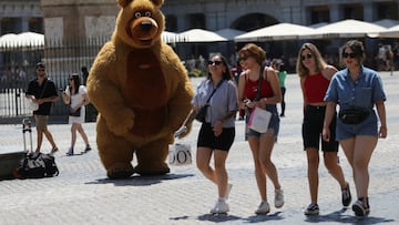 A street performer in a bear suit stands under the sun at Plaza Mayor, during the second heatwave of the year, in Madrid, Spain, July 20, 2022. REUTERS/Isabel Infantes