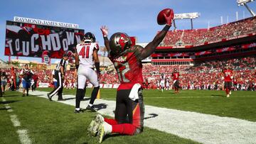 TAMPA, FL - DECEMBER 30: Wide receiver Chris Godwin #12 of the Tampa Bay Buccaneers celebrates his touchdown in the second quarter of the game against the Atlanta Falcons at Raymond James Stadium on December 30, 2018 in Tampa, Florida. Will Vragovic/Get