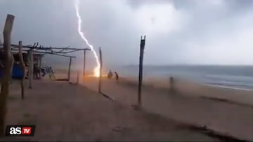 A tragedy caught on camera - two people were struck by lightning on Playa Maruata, a beach in Michoacan, Mexico during a terrifying storm.