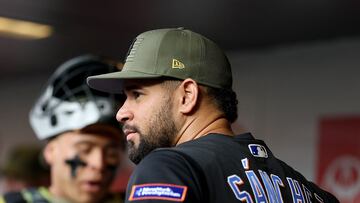 NEW YORK, NEW YORK - MAY 19: Gary Sanchez #33 of the New York Mets looks on from the dugout before the game against the Cleveland Guardians at Citi Field on May 19, 2023 in the Flushing neighborhood of the Queens borough of New York City. Players and coaches are wearing special hats, socks and protective gear in honor of Armed Services Day. Elsa/Getty Images/AFP (Photo by ELSA / GETTY IMAGES NORTH AMERICA / Getty Images via AFP)