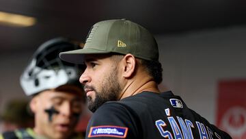 NEW YORK, NEW YORK - MAY 19: Gary Sanchez #33 of the New York Mets looks on from the dugout before the game against the Cleveland Guardians at Citi Field on May 19, 2023 in the Flushing neighborhood of the Queens borough of New York City. Players and coaches are wearing special hats, socks and protective gear in honor of Armed Services Day.   Elsa/Getty Images/AFP (Photo by ELSA / GETTY IMAGES NORTH AMERICA / Getty Images via AFP)