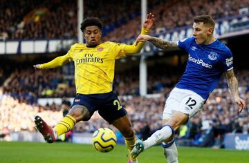 Everton's Lucas Digne in action with Arsenal's Reiss Nelson