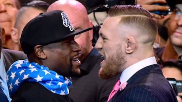 Floyd Mayweather Jr. y Conor McGregor durante el primero de sus careos previos a su combate.