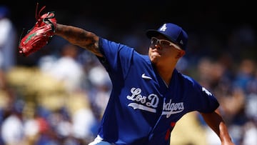 LOS ANGELES, CALIFORNIA - AUGUST 13: Julio Urias #7 of the Los Angeles Dodgers throws against the Colorado Rockies in the first inning at Dodger Stadium on August 13, 2023 in Los Angeles, California.   Ronald Martinez/Getty Images/AFP (Photo by RONALD MARTINEZ / GETTY IMAGES NORTH AMERICA / Getty Images via AFP)