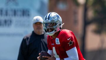 Jul 31, 2023; Oxnard, CA, USA; Dallas Cowboys quarterback Dak Prescott (4) rolls out in front of Dallas Cowboys head coach Mike McCarthy during training camp at the Marriott Residence Inn-River Ridge playing fields. Mandatory Credit: Jason Parkhurst-USA TODAY Sports