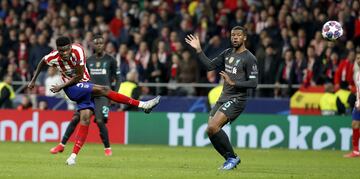 Thomas Partey y Georginio Wijnaldum.