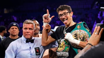 LAS VEGAS, NEVADA - MARCH 28: WBC super welterweight champion Sebastian Fundora poses with referee Thomas Taylor after defeating Keith Thurman in a title fight at MGM Grand Garden Arena on March 28, 2026 in Las Vegas, Nevada. Fundora retained his title with a sixth-round TKO. Steve Marcus/Getty Images/AFP (Photo by Steve Marcus / GETTY IMAGES NORTH AMERICA / Getty Images via AFP)