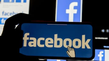 FILE PHOTO: The Facebook logo is displayed on a mobile phone in this picture illustration taken December 2, 2019. REUTERS/Johanna Geron/Illustration/File Photo