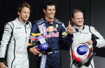 Mark Webber, Rubens Barrichello y Jenson Button en el Gran Premio de Inglaterra en julio 2009.