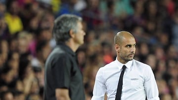 Jose Mourinho &amp; Josep Guardiola during a Barcelona against Real Madrid game at the Camp Nou on August 17, 2011.
