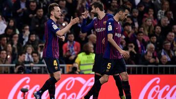 Lo centrocampistas del Barcelona, Ivan rakitic y Sergio Busquets.