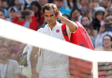 Federer will struggle away from Wimbledon, says Tim Henman