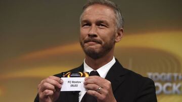 Europa League final ambassador Patrik Andersson shows the name of Rostov during the draw for the round of 16 of the UEFA Europa League