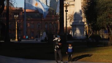 A family walks in Plaza de Mayo, in Buenos Aires, Argentina July 16, 2021. Picture taken July 16, 2021. REUTERS/Matias Baglietto