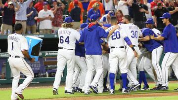 ARLINGTON, TX - JUNE 06: Elvis Andrus #1 of the Texas Rangers carries the cooler while A.J. Griffin #64, Ian Desmond #20, Nomar Mazara #30, Yu Darvish #11 and the team celebrate Rougned Odor hitting a double in the ninth inning for Adrian Beltre to make the winning run against the Houston Astros at Globe Life Park in Arlington on June 6, 2016 in Arlington, Texas.   Rick Yeatts/Getty Images/AFP
 == FOR NEWSPAPERS, INTERNET, TELCOS &amp; TELEVISION USE ONLY ==