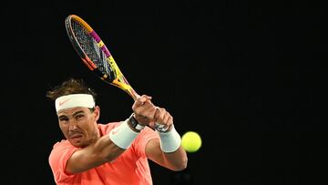 MELBOURNE, AUSTRALIA - FEBRUARY 13: Rafael Nadal of Spain plays a backhand in his Men's Singles third round match against Cameron Norrie of Great Britain during day six of the 2021 Australian Open at Melbourne Park on February 13, 2021 in Melbourne, Australia. (Photo by Quinn Rooney/Getty Images)