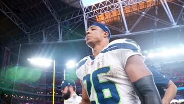 Dec 8, 2024; Glendale, Arizona, USA; Seattle Seahawks running back Zach Charbonnet (26) leaves the field after the game against the Arizona Cardinals at State Farm Stadium. Mandatory Credit: Joe Camporeale-Imagn Images