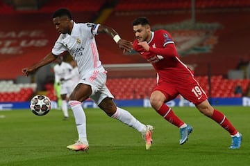 Vinicius vies with Liverpool's Turkish defender Ozan Kabak at Anfield.