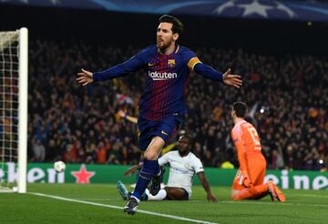 Messi celebrates after scoring.