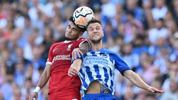 Liverpool's Colombian midfielder #07 Luis Diaz (L) vies with Brighton's Dutch defender #34 Joel Veltman (R) during the English Premier League football match between Brighton and Hove Albion and Liverpool at the American Express Community Stadium in Brighton, southern England on October 8, 2023. (Photo by Glyn KIRK / AFP) / RESTRICTED TO EDITORIAL USE. No use with unauthorized audio, video, data, fixture lists, club/league logos or 'live' services. Online in-match use limited to 120 images. An additional 40 images may be used in extra time. No video emulation. Social media in-match use limited to 120 images. An additional 40 images may be used in extra time. No use in betting publications, games or single club/league/player publications. / 