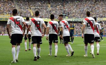 River Plate players celebrate an own goal by Boca Juniors' Carlos Izquierdoz during their first leg match of the all-Argentine Copa Libertadores final, at La Bombonera stadium in Buenos Aires, on November 11, 2018. 