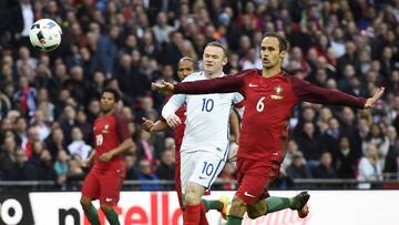 Britain Football Soccer - England v Portugal - International Friendly - Wembley Stadium - 2/6/16
 England&#039;s Wayne Rooney in action with Portugal&#039;s Ricardo Carvalho 
 Reuters / Dylan Martinez
 Livepic
 EDITORIAL USE ONLY.