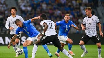 Italy's forward Gianluca Scamacca (L) challenges Germany's defender Antonio Ruediger during the UEFA Nations League - League A, Group 3 first leg football match between Italy and Germany on June 4, 2022 at the Renato Dall'Ara stadium in Bologna. (Photo by MIGUEL MEDINA / AFP) (Photo by MIGUEL MEDINA/AFP via Getty Images)