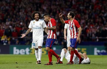 Marcelo complaining at Correa after the Argentinian player kicked Benzema's head with ball.