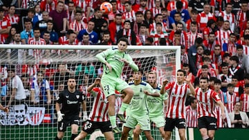 Las Palmas' Spanish defender #03 Mika Marmol (C) jumps for a header during the Spanish league football match between Athletic Club Bilbao and UD Las Palmas at the San Mames stadium in Bilbao, on April 23, 2025. (Photo by ANDER GILLENEA / AFP)