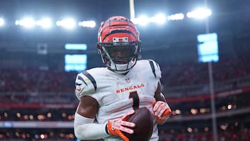 Oct 8, 2023; Glendale, Arizona, USA; Cincinnati Bengals wide receiver Ja'Marr Chase (1) celebrates a touchdown catch against the Arizona Cardinals during the second half at State Farm Stadium. Mandatory Credit: Joe Camporeale-USA TODAY Sports