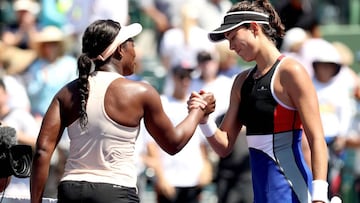 KEY BISCAYNE, FL - MARCH 26: Sloane Stephens celebrates is congratulated by Garbine Muguruza of Spain after their match during the Miami Open Presented by Itau at Crandon Park Tennis Center on March 26, 2018 in Key Biscayne, Florida.   Matthew Stockman/Ge