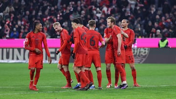 Bayern Munich's English forward #09 Harry Kane (2nd R) celebrates with team mates after a free kick scoring the 3-0 goal at the end of the German first division Bundesliga football match FC Bayern Munich vs SV Werder Bremen in Munich, southern Germany on February 7, 2025. (Photo by Alexandra BEIER / AFP) / DFL REGULATIONS PROHIBIT ANY USE OF PHOTOGRAPHS AS IMAGE SEQUENCES AND/OR QUASI-VIDEO