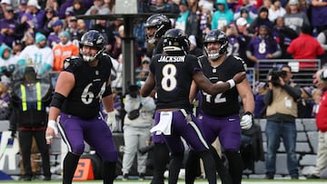 BALTIMORE, MARYLAND - DECEMBER 31: Patrick Ricard #42 of the Baltimore Ravens celebrates with Lamar Jackson #8 after catching a pass for a touchdown against the Miami Dolphins during the fourth quarter of the game at M&T Bank Stadium on December 31, 2023 in Baltimore, Maryland.   Todd Olszewski/Getty Images/AFP (Photo by Todd Olszewski / GETTY IMAGES NORTH AMERICA / Getty Images via AFP)