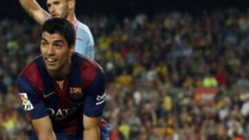 Sergio Álvarez, junto a Luis Suárez