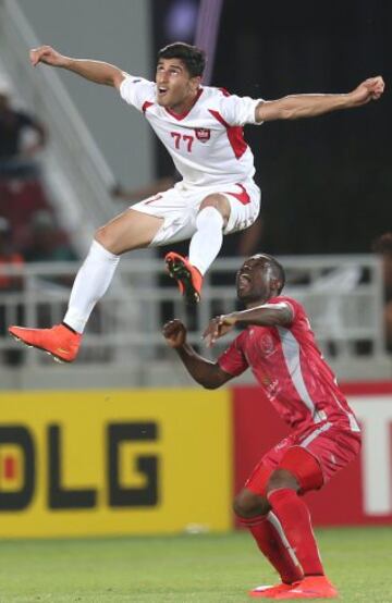 Mohammed Abdullah y Ali Alipurghara en un espectacular salto.