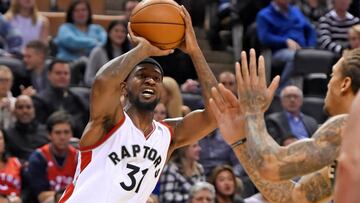 Dec 12, 2016; Toronto, Ontario, CAN; Toronto Raptors guard Terrence Ross (31) shoots for a three point basket past Milwaukee Bucks forward Michael Beasley (9) in the second half at Air Canada Centre. The Raptors won 122-100. Mandatory Credit: Dan Hamilton-USA TODAY Sports