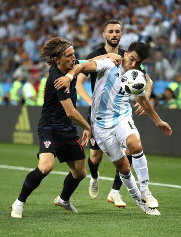 Luka Modric, Marcos Acuña and Marcelo Brozovic.