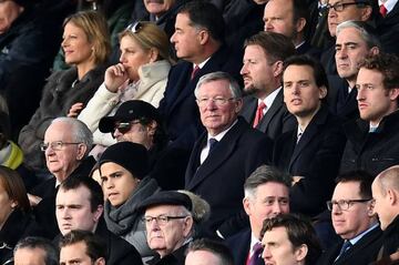 Manchester United's Scottish former manager Alex Ferguson watches Manchester United and Arsenal from the stands.