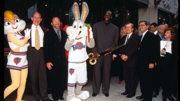 Michael Jordan poses with Warner Brothers executives and mascots from the "Looney Tunes' during a promotional event for the release of 'Space Jam.'