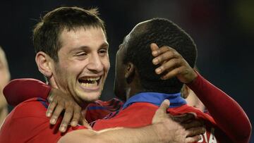 CSKA Moscow&#039;s Russian midfielder Alan Dzagoev (L) and Ivorian forward Seydou Doumbia celebrate. Another league title won.