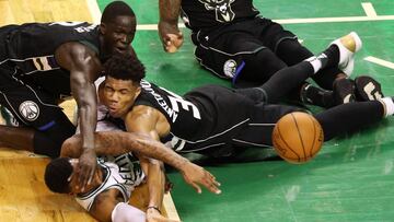 BOSTON, MA - APRIL 24: Marcus Smart #36 of the Boston Celtics competes for a loose ball against Giannis Antetokounmpo #34 of the Milwaukee Bucks and Thon Maker #7 during the fourth quarter in Game Five in Round One of the 2018 NBA Playoffs at TD Garden on April 24, 2018 in Boston, Massachusetts. The Celtics defeat the Bucks 92-87.   Maddie Meyer/Getty Images/AFP
 == FOR NEWSPAPERS, INTERNET, TELCOS &amp; TELEVISION USE ONLY ==