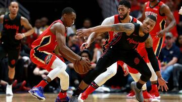 NEW ORLEANS, LA - APRIL 19: Damian Lillard #0 of the Portland Trail Blazers is fouled by Rajon Rondo #9 of the New Orleans Pelicans during Game 3 of the Western Conference playoffs against the Portland Trail Blazers at the Smoothie King Center on April 19